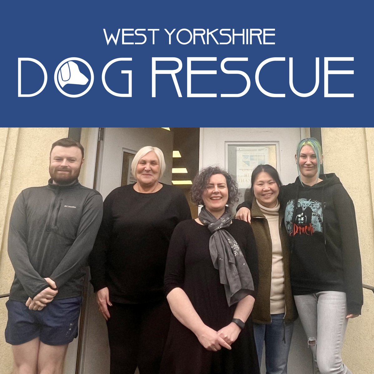 group of volunteers outside doors of West Yorkshire Dog Rescue