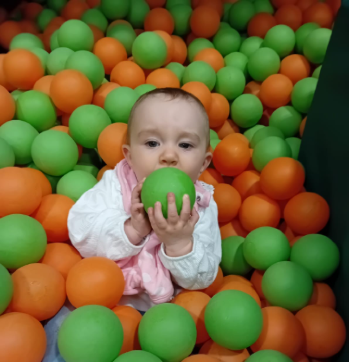 Baby in ball pit