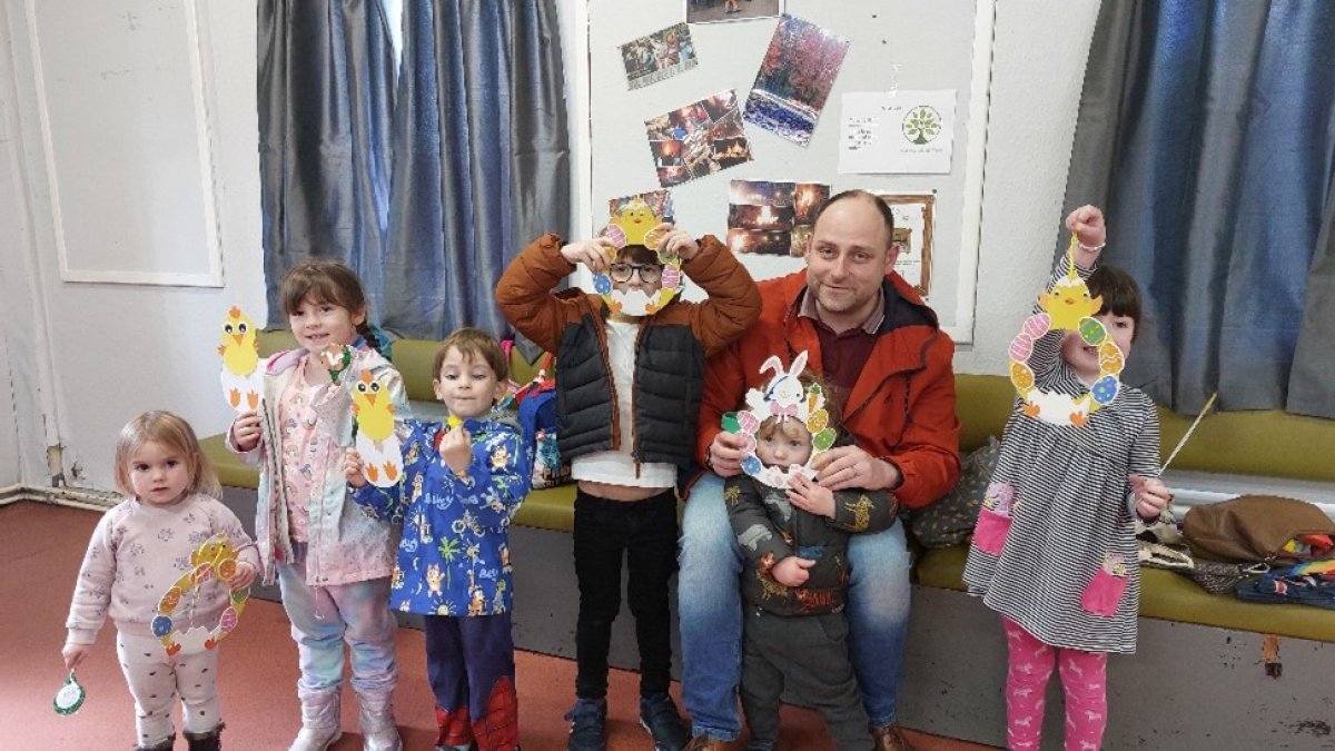 Group of children wearing easter masks