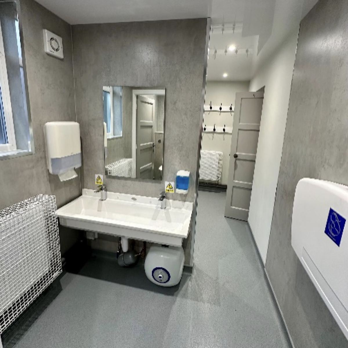 Photo of a newly renovated public bathroom in a community parish hall