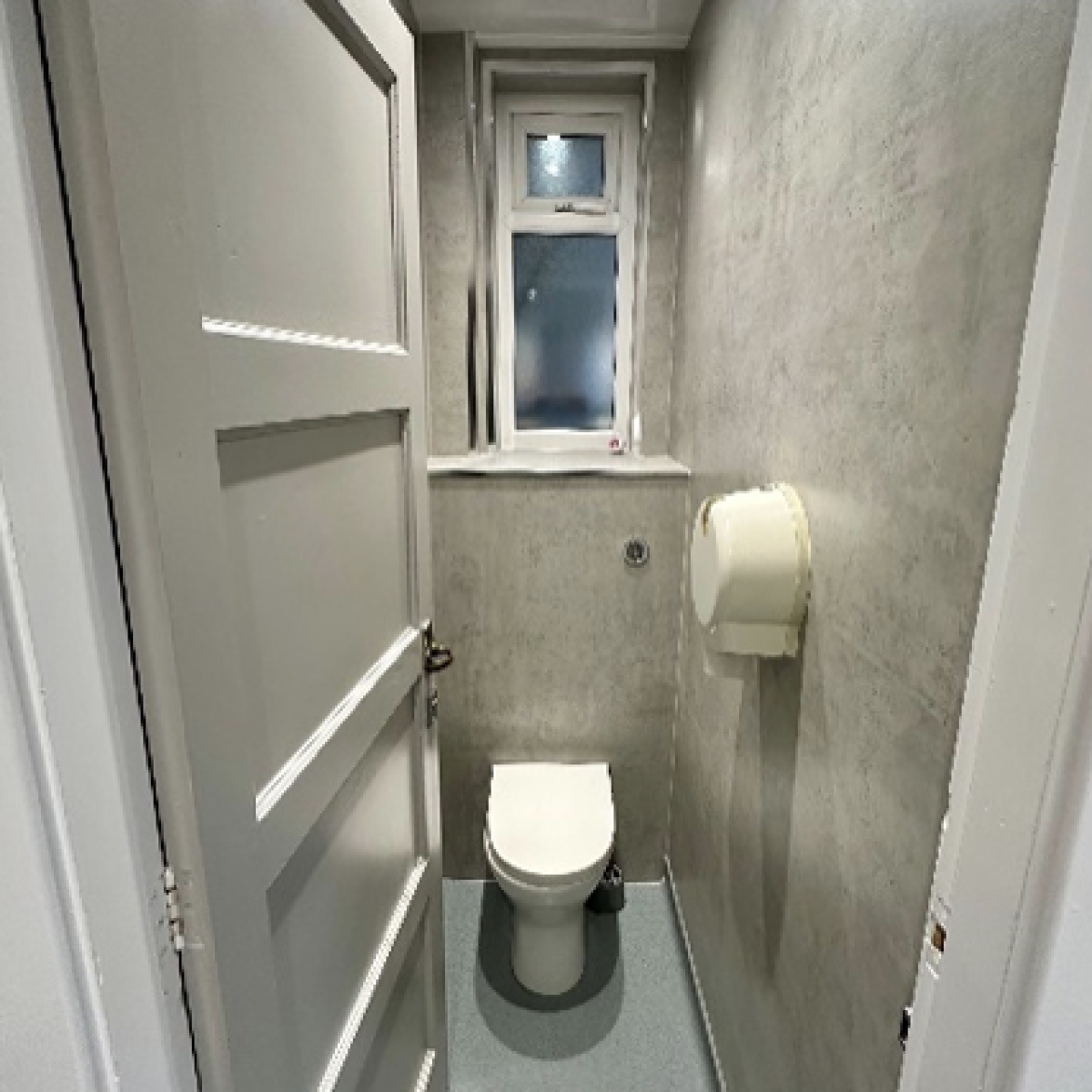 Photo of a newly renovated toilet in a community parish hall