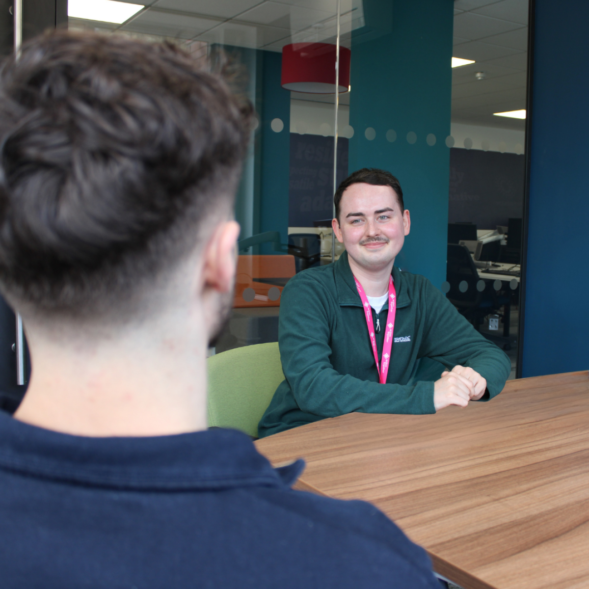 Social Prescriber sat looking at a client