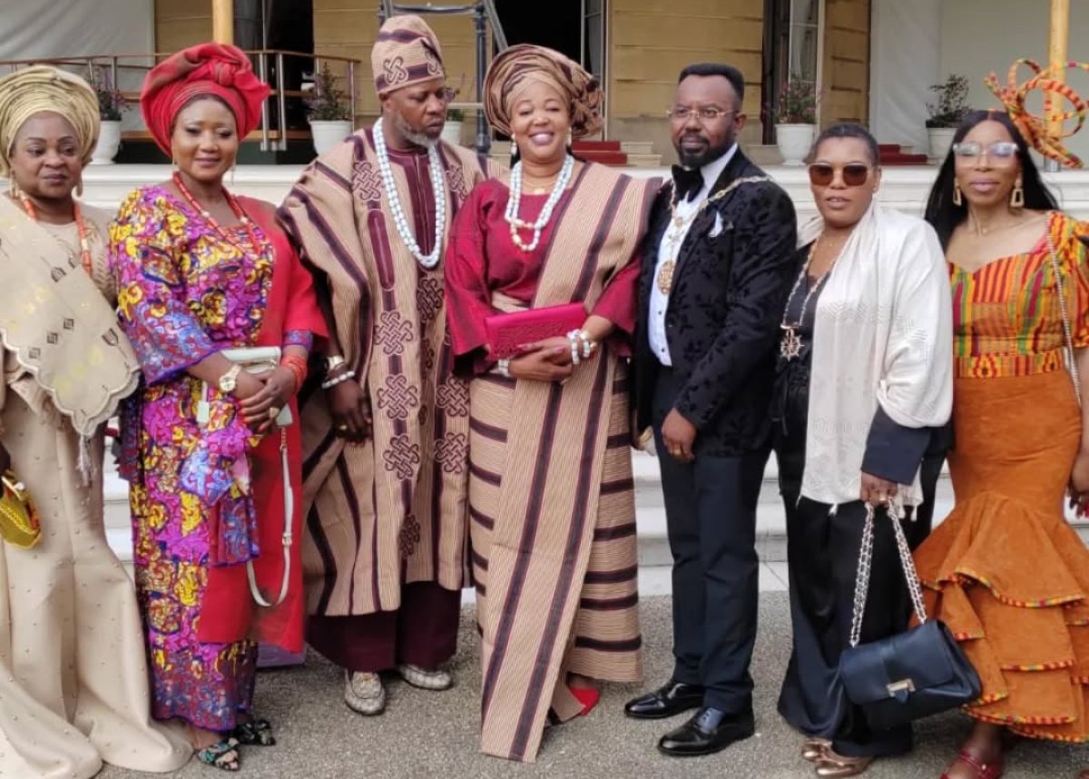 Group image of Caring and Sharing Rochdale CEO and founders in front of Buckingham Palace in May 2025