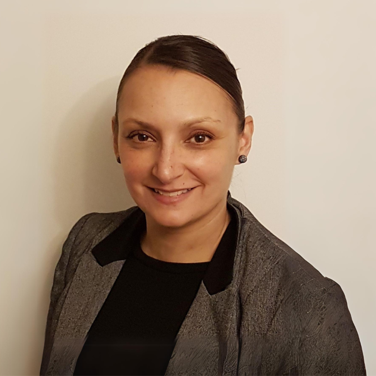 woman stood in front of wall