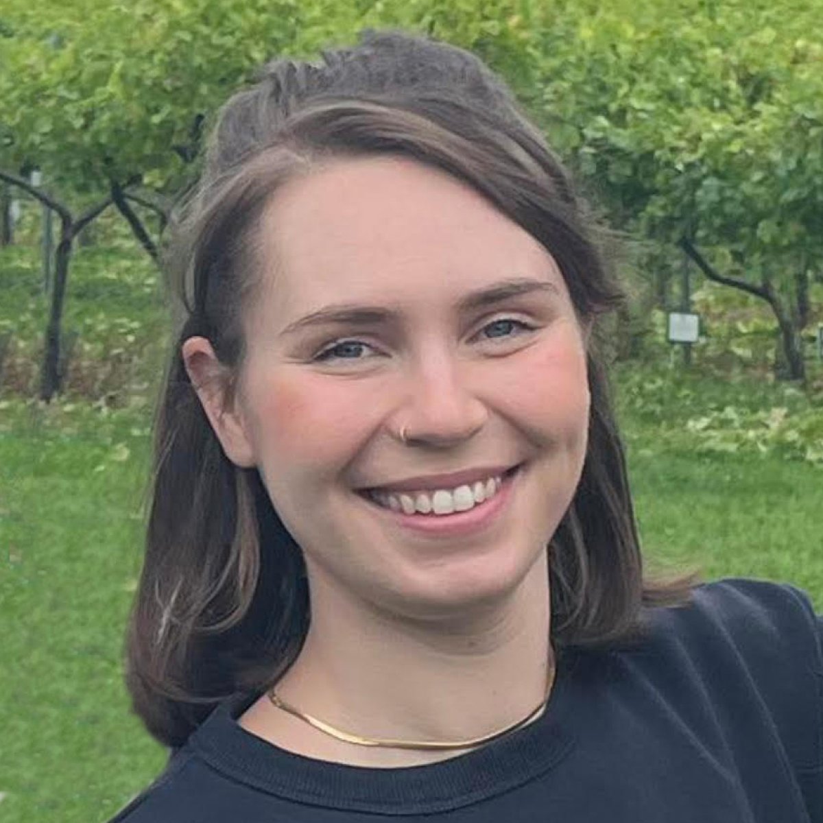 Photo of Charly Peters smiling at camera