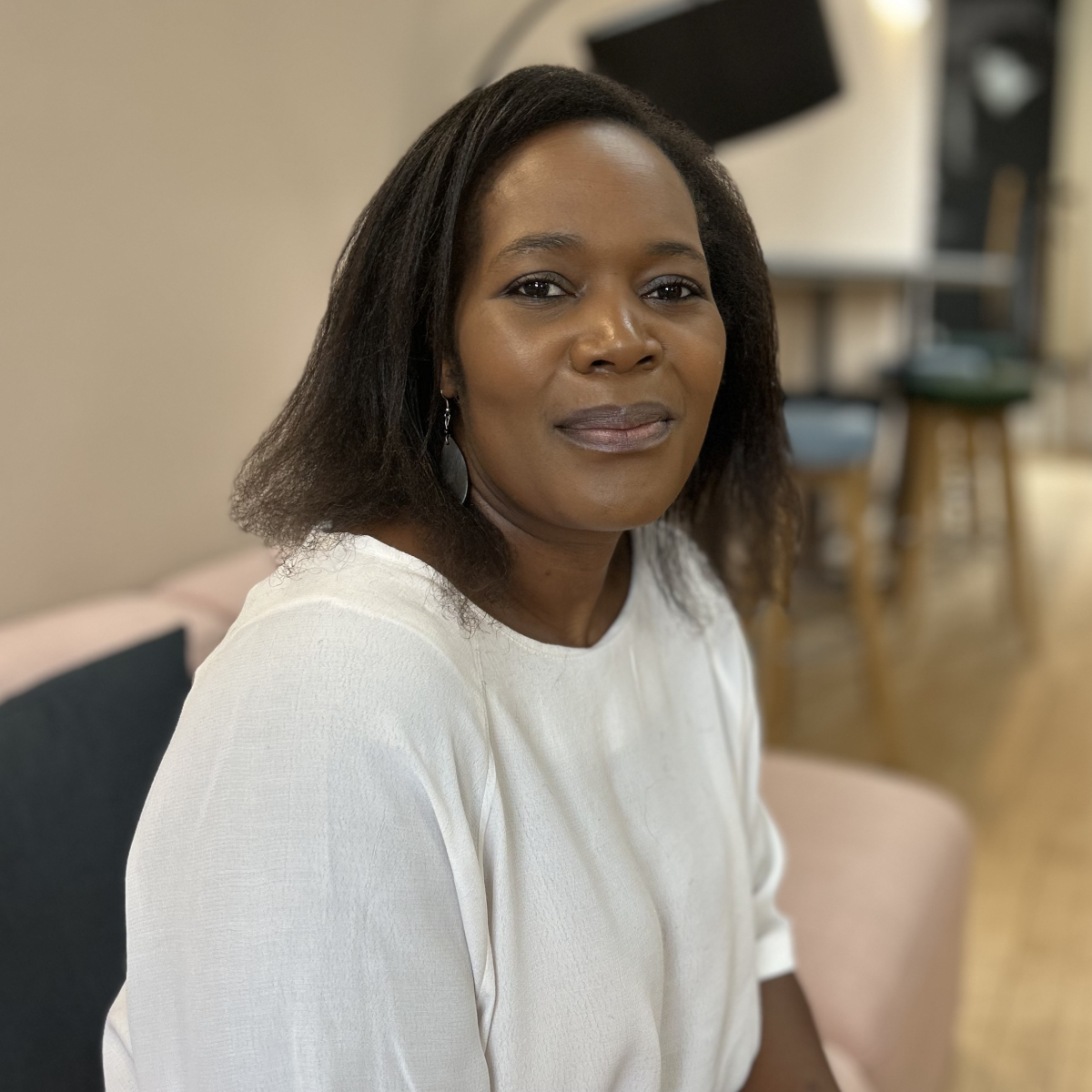 Photo of Judith Nyanjowa smiling at camera