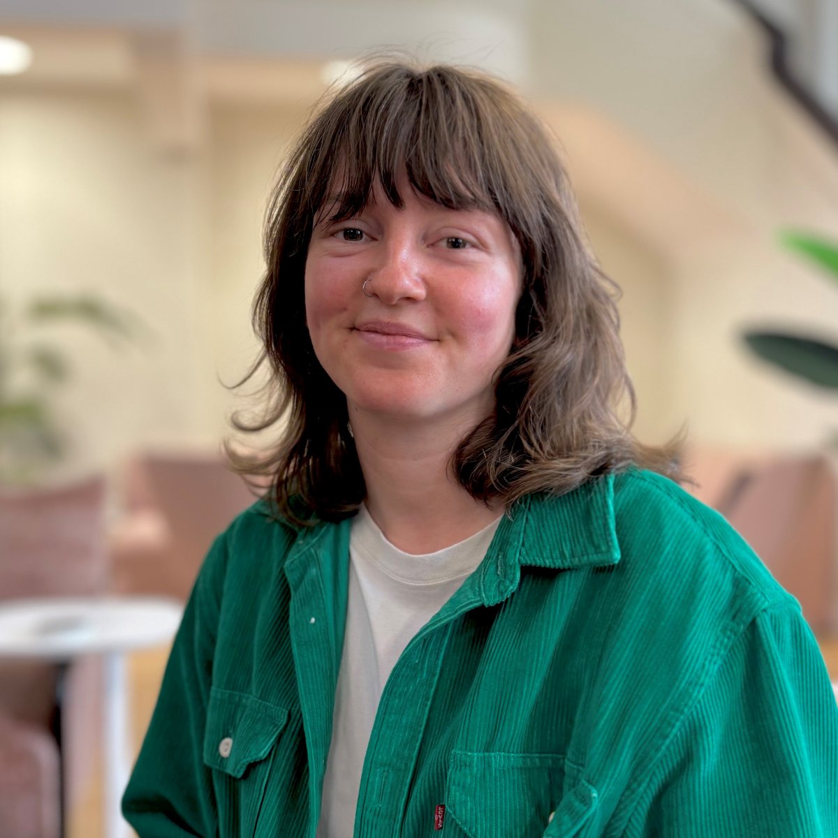 Photo of Maddy Hubbard smiling at camera