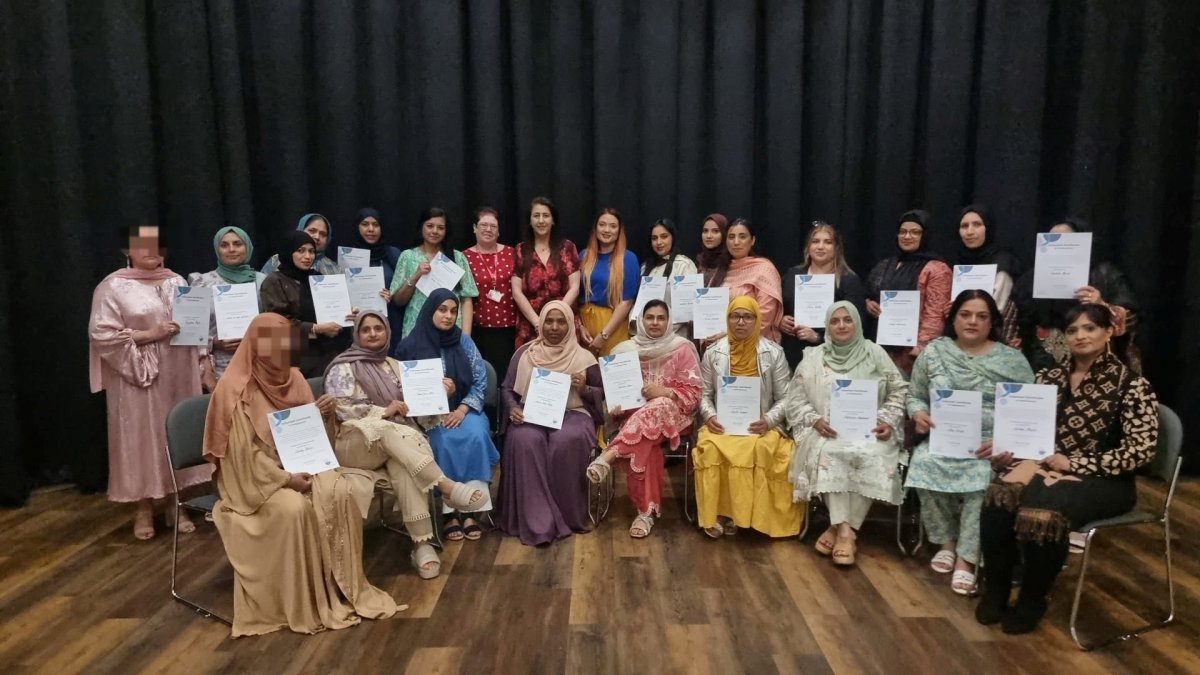 Group photo of women holding certificates 
