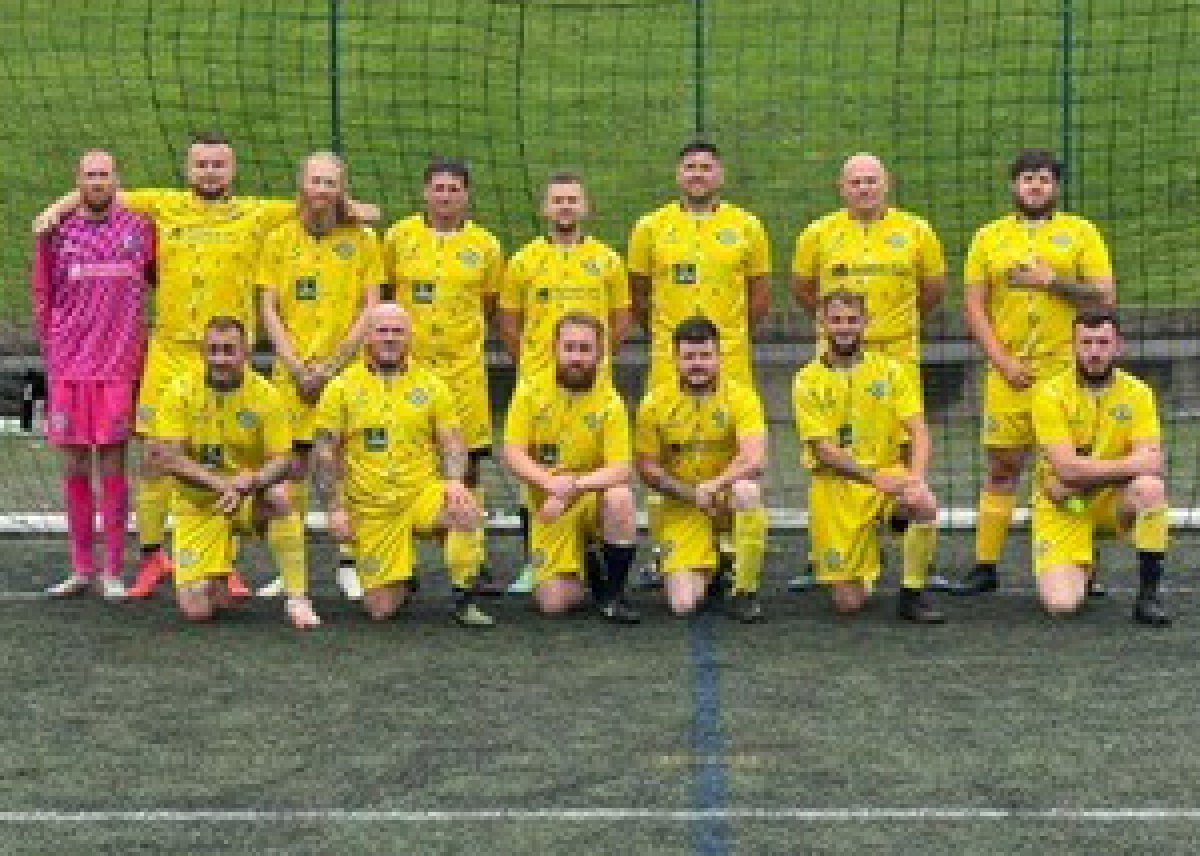 Football team Rochdale Vets AFC pictured in front of a goal