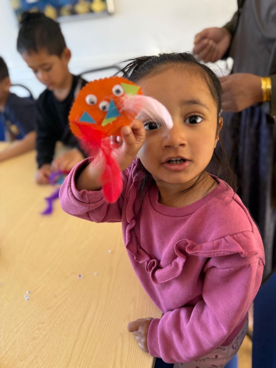 Girl holding craft project