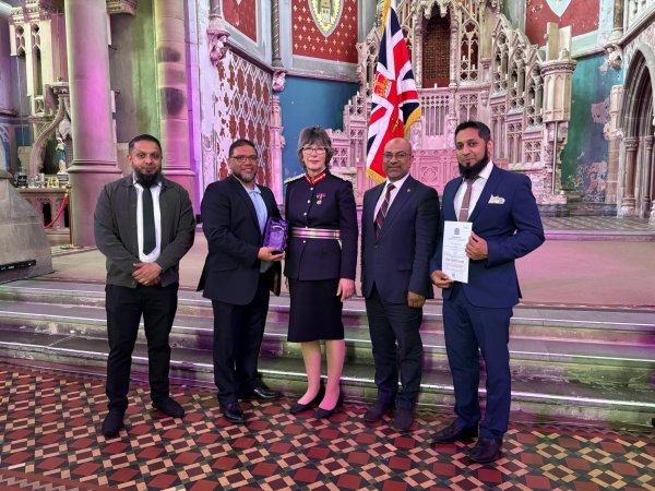 Yuvanis receiving the Kings Award for Voluntary Service