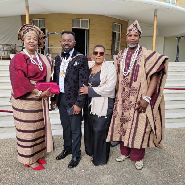 Four members of Caring and Sharing Rochdale at Buckingham Palace KAVS award ceremony